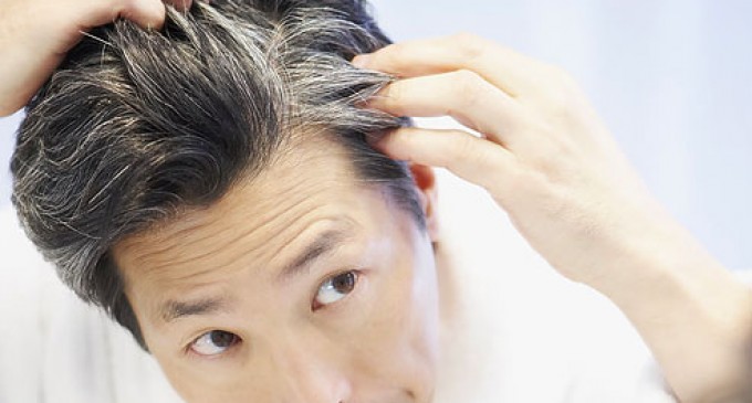 photolibrary_rf_photo_of_man_looking_at_gray_hair-680x365
