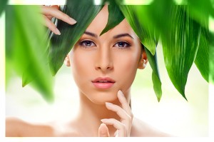 beautiful girl and green leaves