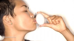 Woman-Kissing-Egg